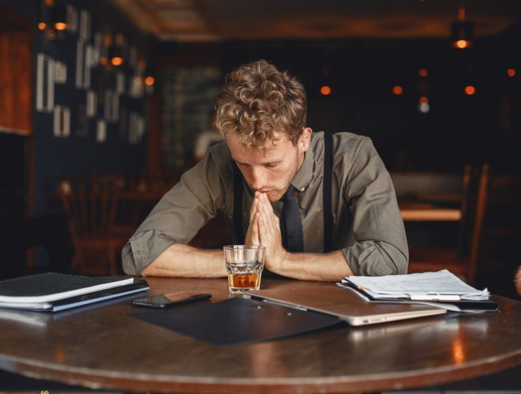 Wellbrook Recovery shows a businessman in a bar to demonstrate the struggles of the functioning alcoholic