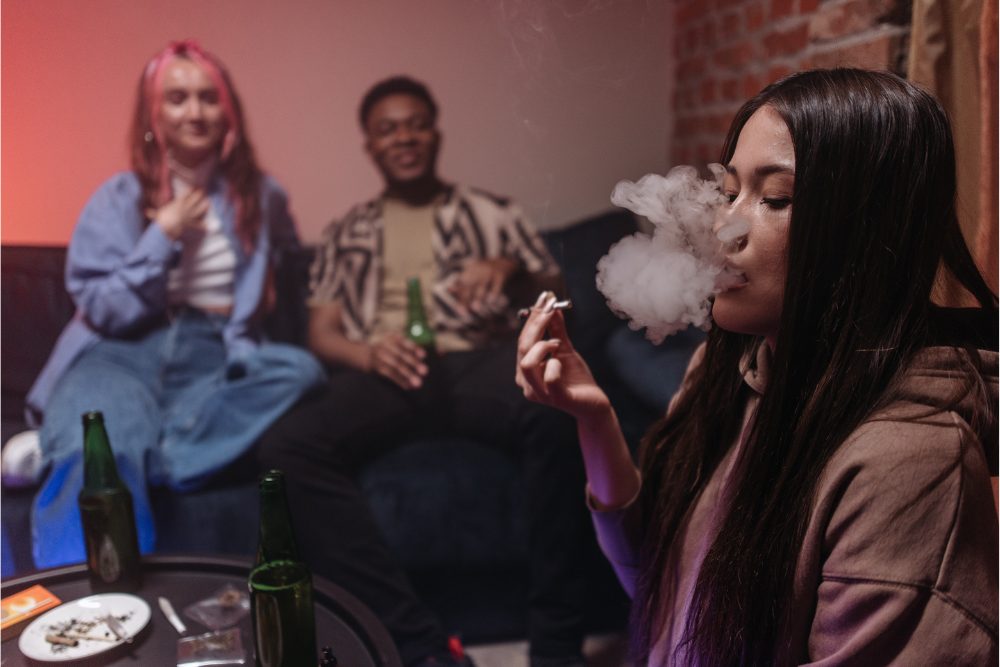 Wellbrook Recovery shows a group of friends smoking a substance progressing through the stages of addiction