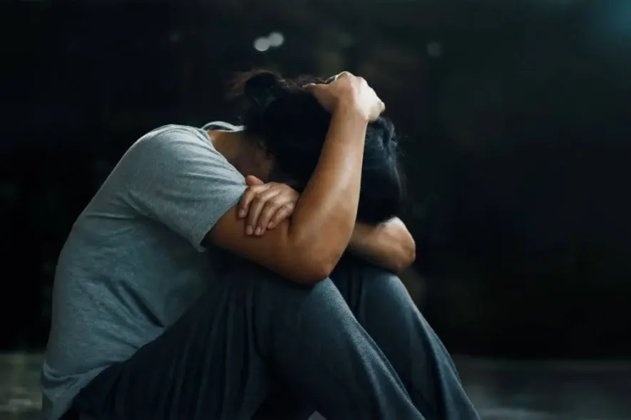 Depressed teen. Wellbrook Recovery explores: Is addiction a disease or a choice?