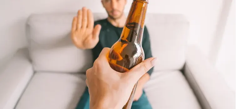 man saying no to alcohol and other addictions