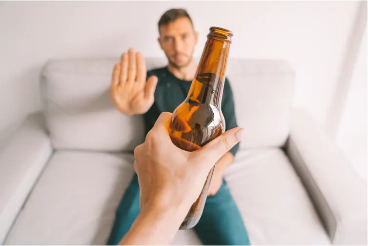 man saying no to alcohol and other addictions
