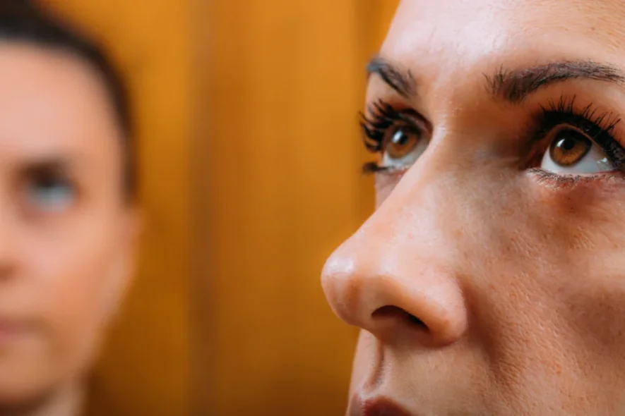 Focused view of a woman’s eye movement in an EMDR for addiction treatment session.
