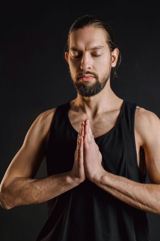 Man practicing mindfulness for addiction through focused breathing exercises and meditation.