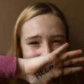 A girl cries out for help as she struggles with the early signs of addiction