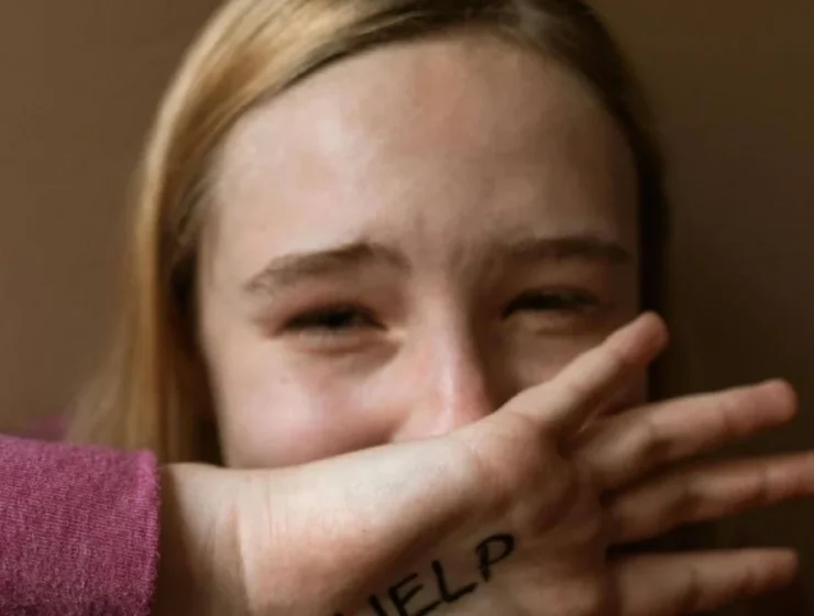 A girl cries out for help as she struggles with the early signs of addiction