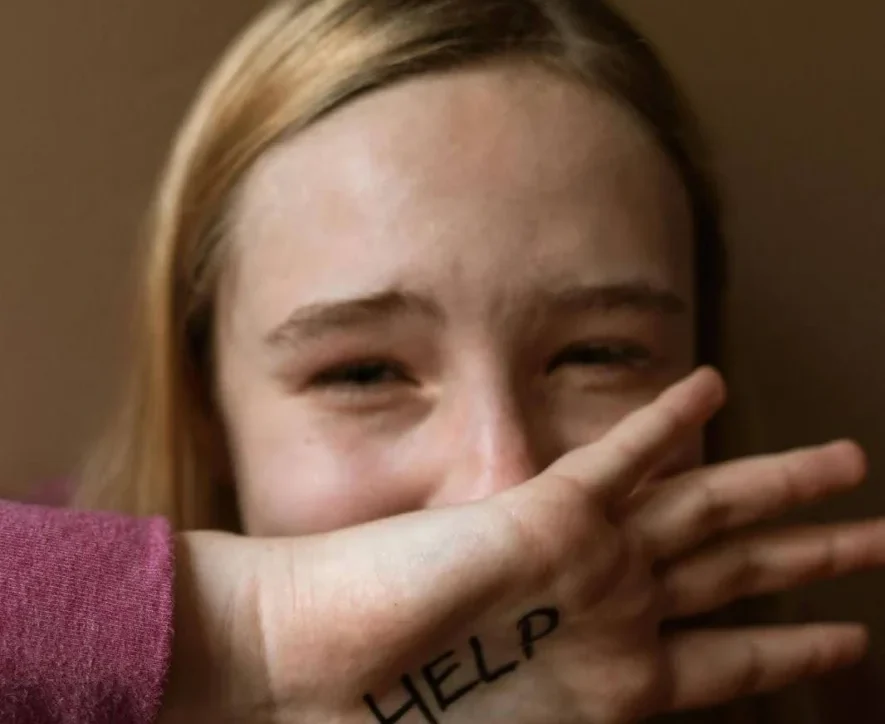 A girl cries out for help as she struggles with the early signs of addiction