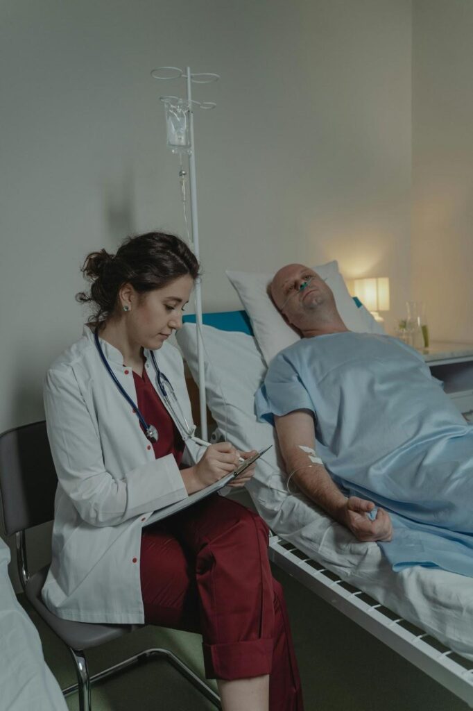 Man attended by a medical professional, illustrating benzo detox with medical supervision supporting safe benzodiazepine withdrawal.