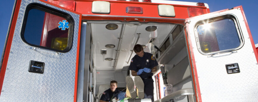 medical-personnel-assisting-patient-in-ambulance-2026-03-26-03-46-32-utc