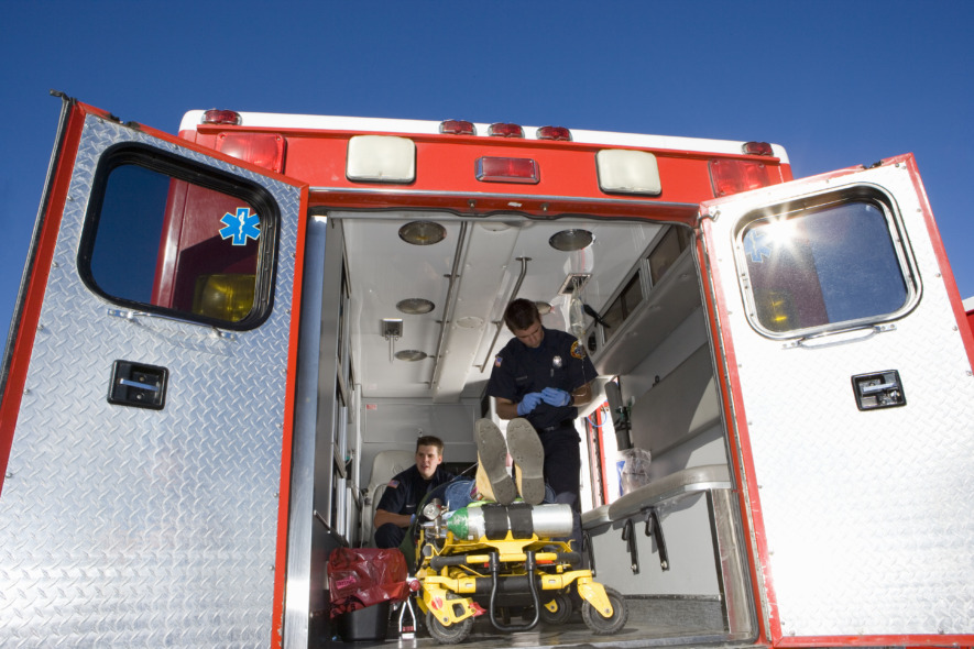 medical-personnel-assisting-patient-in-ambulance-2026-03-26-03-46-32-utc